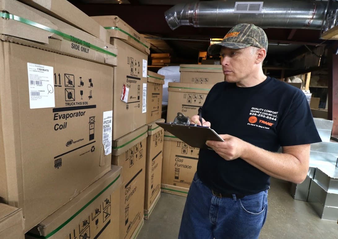 Steady Flame Fireplaces technician checking inventory