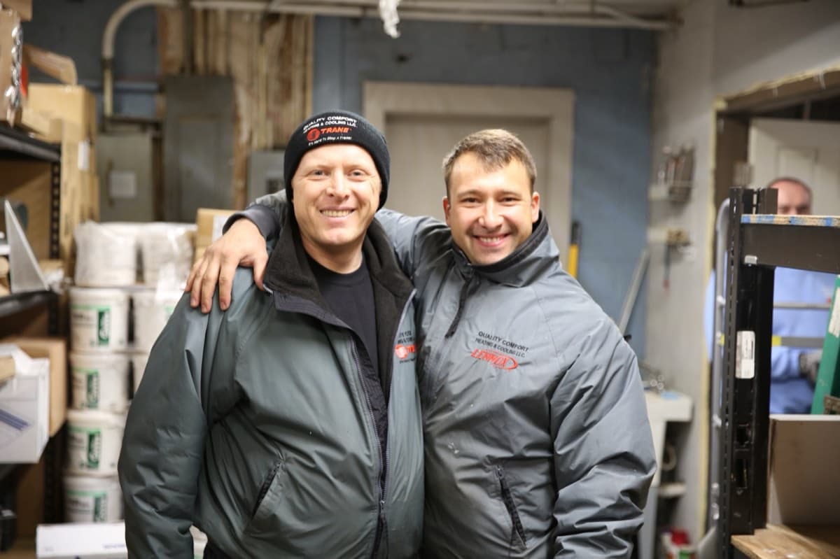 Steady Flame Fireplaces team members in the warehouse